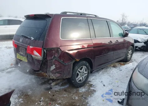 2010 Honda Odyssey Ex-L z USA, uszkodzony, nr VIN 5FNRL3H75AB058416